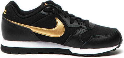 nike dames zwart schoenen goud